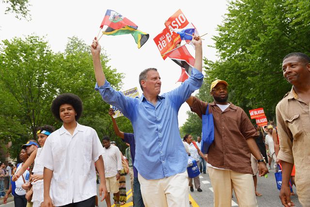 de Blasio, with son Dante on the left, at yesterday's West Indian American Day Parade